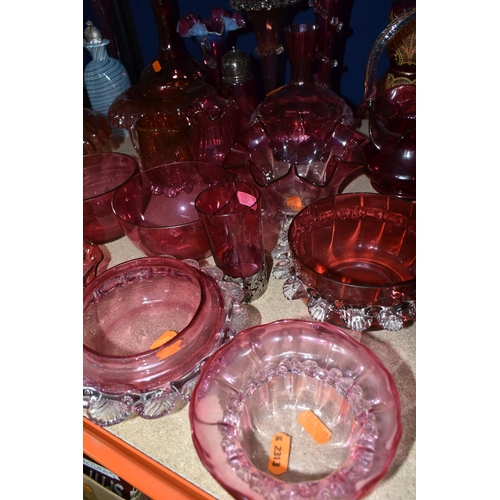 412 - A COLLECTION OF CRANBERRY GLASSWARE, comprising a Bohemian crystal decanter decorated with stylised ... 