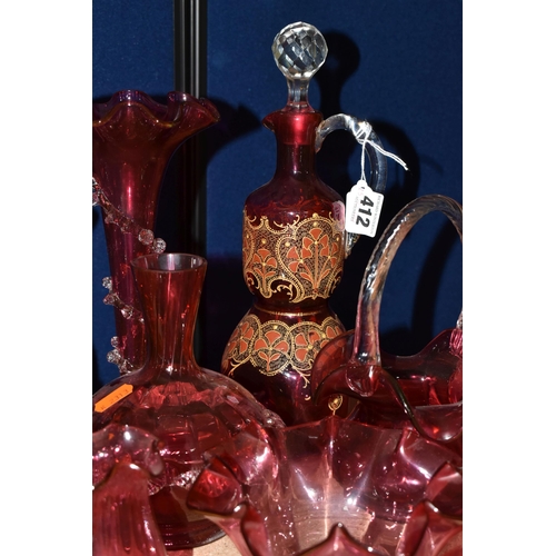 412 - A COLLECTION OF CRANBERRY GLASSWARE, comprising a Bohemian crystal decanter decorated with stylised ... 