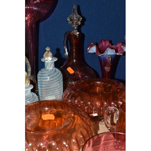 412 - A COLLECTION OF CRANBERRY GLASSWARE, comprising a Bohemian crystal decanter decorated with stylised ... 