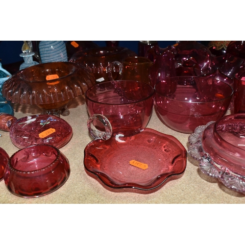 412 - A COLLECTION OF CRANBERRY GLASSWARE, comprising a Bohemian crystal decanter decorated with stylised ... 