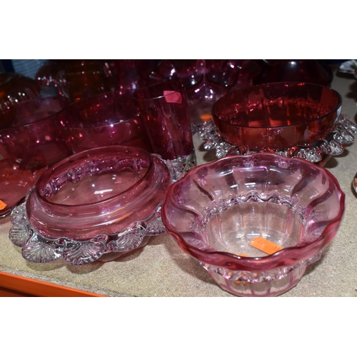 412 - A COLLECTION OF CRANBERRY GLASSWARE, comprising a Bohemian crystal decanter decorated with stylised ... 