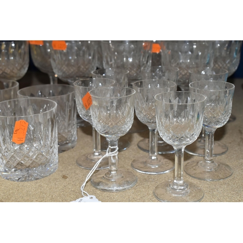 413 - A SUITE OF THOMAS WEBB CUT CRYSTAL 'NORMANDY' PATTERN GLASSES AND DECANTERS, comprising a red wine d... 