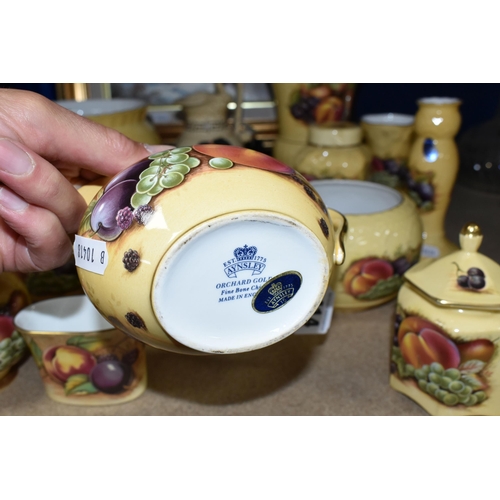 414 - A COLLECTION OF AYNSLEY 'ORCHARD GOLD' PATTERN GIFTWARE, comprising a preserve pot, ginger jar, tea ... 