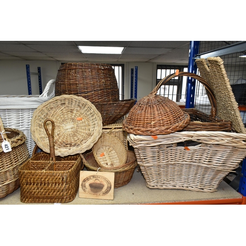 421 - A LARGE QUANTITY OF WICKER BASKETS AND HAMPERS, comprising shopping baskets, linen baskets, picnic h... 