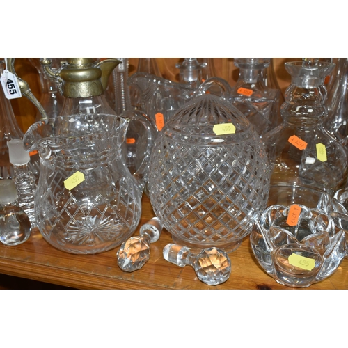 455 - A GROUP OF CUT GLASS, comprising a Victorian cut crystal claret jug with a silverplate lid and handl... 