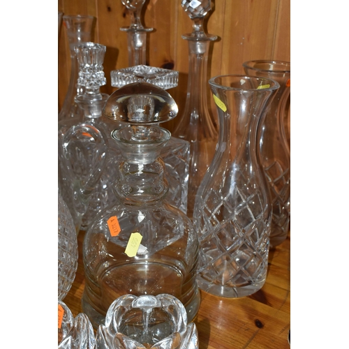 455 - A GROUP OF CUT GLASS, comprising a Victorian cut crystal claret jug with a silverplate lid and handl... 