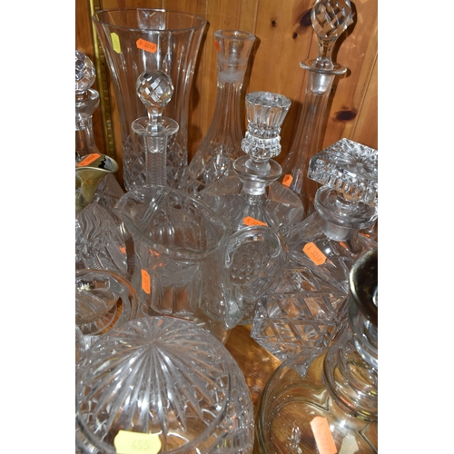 455 - A GROUP OF CUT GLASS, comprising a Victorian cut crystal claret jug with a silverplate lid and handl... 