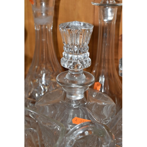 455 - A GROUP OF CUT GLASS, comprising a Victorian cut crystal claret jug with a silverplate lid and handl... 