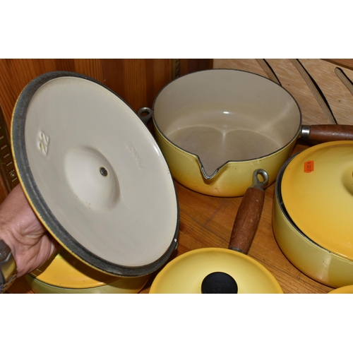 457 - A COLLECTION OF LIDDED LE CREUSET SAUCEPANS IN 'SOLEIL YELLOW', five graduated lidded saucepans, com... 