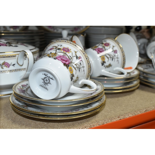 462 - A NORITAKE 'ASIAN DREAM' PATTERN 2502 DINNER SET, comprising one large oval meat plate, a smaller ov... 