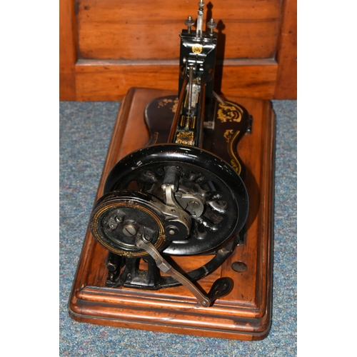 508 - A VICTORIAN SINGER HAND CRANK SEWING MACHINE, possibly an 1884 year model 12k, there are two rows of... 