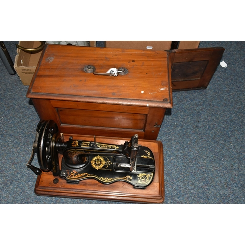 508 - A VICTORIAN SINGER HAND CRANK SEWING MACHINE, possibly an 1884 year model 12k, there are two rows of... 