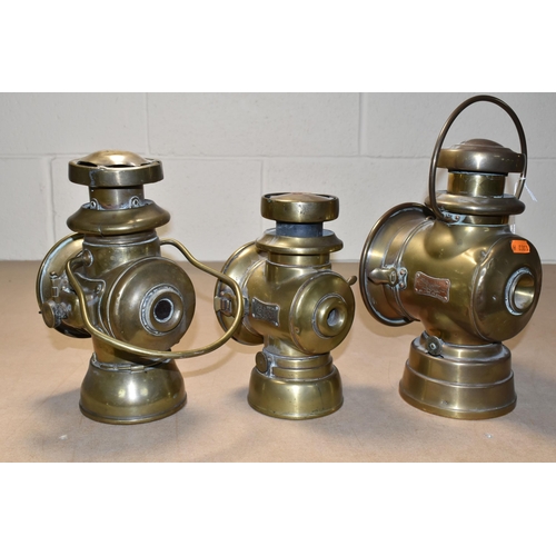 513 - THREE VINTAGE BRASS CAR LAMPS, comprising 'The H & B SIDE LAMP NO 1008', cracked glass to the front,... 