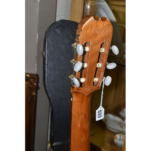 533 - AN EPIPHONE ACOUSTIC GUITAR, made in Japan, with a hard case, solid cedar top, mahogany back and sid... 