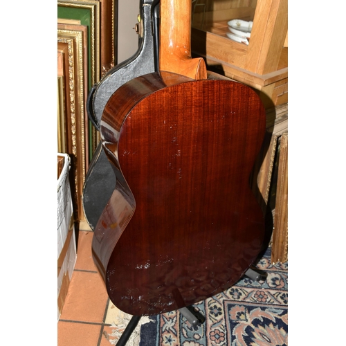 533 - AN EPIPHONE ACOUSTIC GUITAR, made in Japan, with a hard case, solid cedar top, mahogany back and sid... 