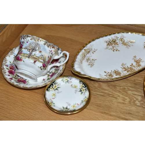 537 - A GROUP OF ROYAL ALBERT TEAWARE, comprising 'poinsettia' pattern two tier cake stand, dinner plate, ... 