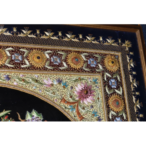 543 - A 20TH CENTURY RAISED NEEDLEWORK PICTURE, depicting still life flower scene to the centre panel bord... 