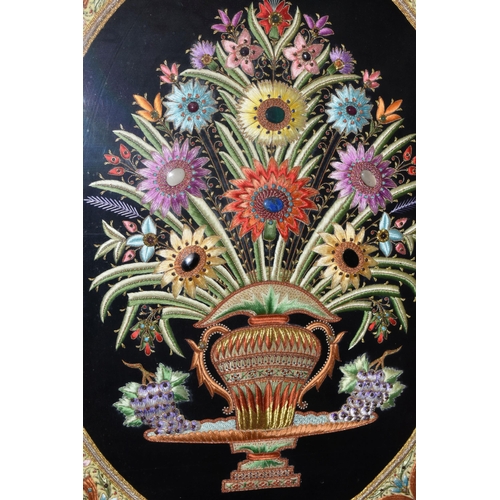 543 - A 20TH CENTURY RAISED NEEDLEWORK PICTURE, depicting still life flower scene to the centre panel bord... 