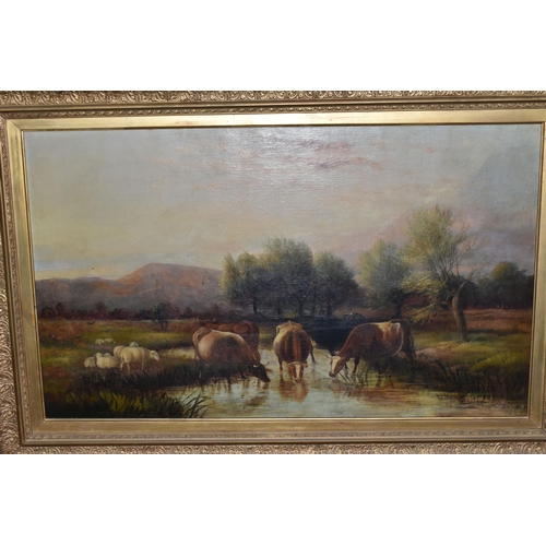 548 - A LATE VICTORIAN PICTURESQUE LANDSCAPE, depicting cattle drinking from a river, no visible signature... 