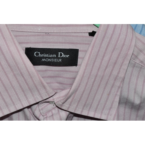 561 - A GROUP OF GENTLEMEN'S CHRISTIAN DIOR CLOTHING, to include one pink striped and one blue striped Chr... 