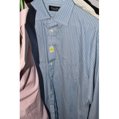 561 - A GROUP OF GENTLEMEN'S CHRISTIAN DIOR CLOTHING, to include one pink striped and one blue striped Chr... 