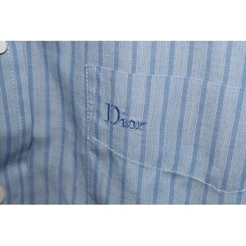 561 - A GROUP OF GENTLEMEN'S CHRISTIAN DIOR CLOTHING, to include one pink striped and one blue striped Chr... 