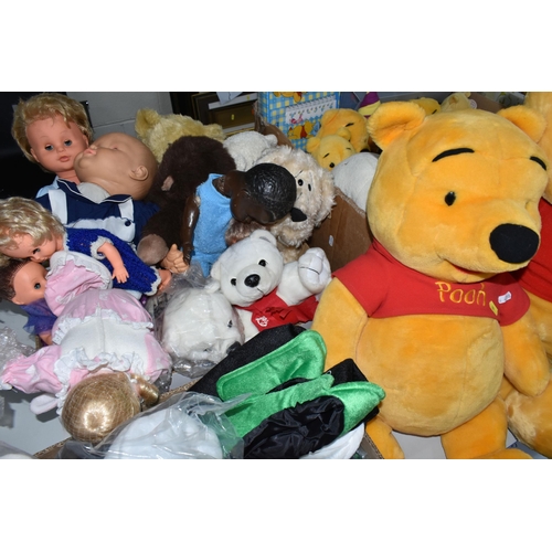 582 - A COLLECTION OF SOFT TOYS AND DOLLS ETC to include a number of Disney Winnie the Pooh bears, largest... 