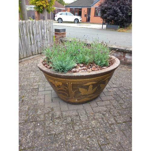 1018 - A LARGE COMPOSITE OVAL TAPERED PLANTER, thats decorated with an oriental pattern, width 118cm x dept... 