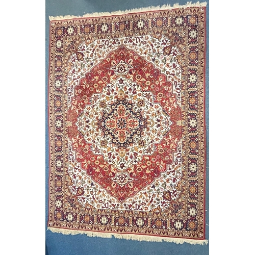 1198 - A LARGE WOOLLEN PERSIAN FLORAL PATTERNED RUG, with a red and cream field, 360cm x 250cm (condition r... 