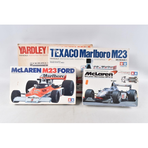 FOUR BOXED UNBUILT TAMIYA MODEL RACECARS, to include a McLaren 