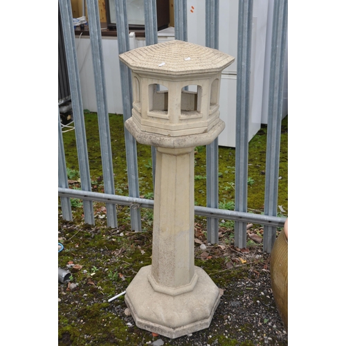 1003 - A COMPOSITE STONE OCTAGONAL BIRD BATH, on a tapered support and base, height 40cm x height 124cm (co... 