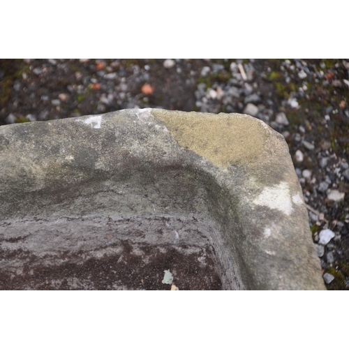 1008 - A RECTANGULAR SANDSTONE TROUGH, length 69cn x 46cm x height 30cm (condition report: one corner with ... 