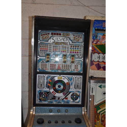 1054 - AN ACE COIN EQUIPMENT VINTAGE SLOT MACHINE with 'Silver Machine' graphics and mechanism, width 53cm ... 