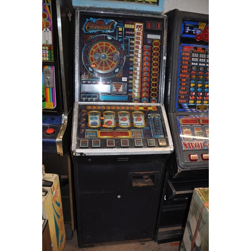 1059 - A CRYSTAL LEISURE SLOT MACHINE with 'Club Carousel' graphics and mechanism (untested and maybe incom... 