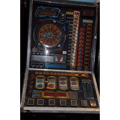 1059 - A CRYSTAL LEISURE SLOT MACHINE with 'Club Carousel' graphics and mechanism (untested and maybe incom... 