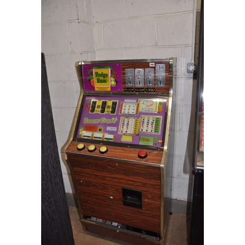 1065 - A VINTAGE BELL FRUITS SLOT MACHINE with 'Bonus Fruits' graphics and mechanism, height 144cm (unteste... 