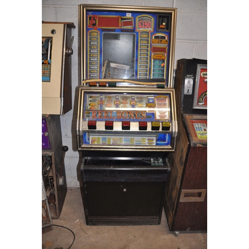 1071 - A JPM SLOT MACHINE with 'Reel Bonus' graphics, width 65cm x height 172cm (untested and maybe incompl... 