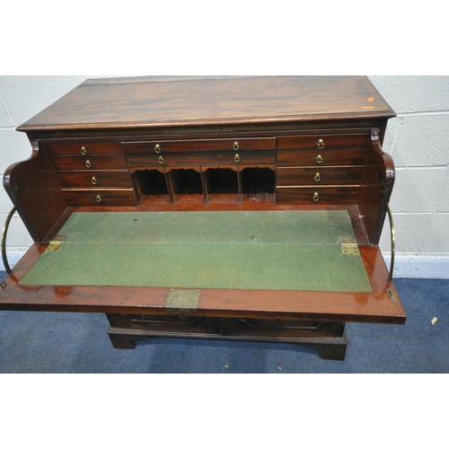 1203 - A GEORGIAN MAHOGANY SECRETAIRE CUPBOARD, the top drawer with a fall front enclosing a fitted interio... 