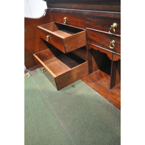 1203 - A GEORGIAN MAHOGANY SECRETAIRE CUPBOARD, the top drawer with a fall front enclosing a fitted interio... 