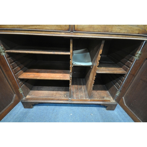 1203 - A GEORGIAN MAHOGANY SECRETAIRE CUPBOARD, the top drawer with a fall front enclosing a fitted interio... 