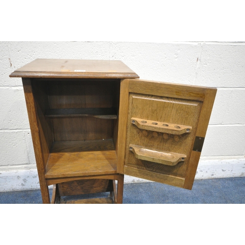 1210 - AN ARTS AND CRAFTS OAK SINGLE DOOR SMOKERS CABINET, width 36cm x depth 31cm x height 78cm (condition... 