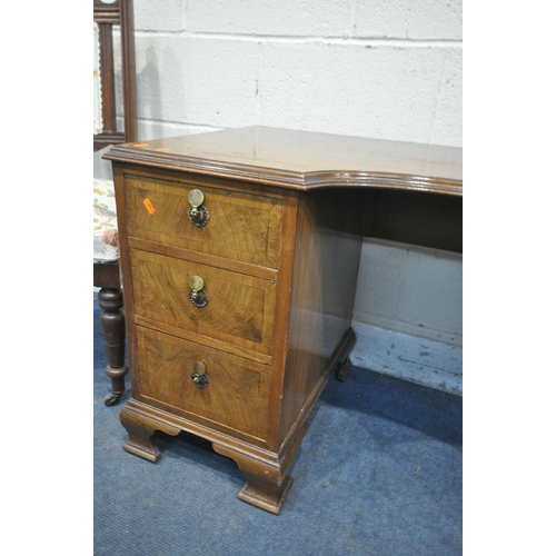 1211 - A WALNUT KNEE HOLE DESK, with six drawers, on bracket feet, width 114cm x depth 53cm x height 65cm, ... 