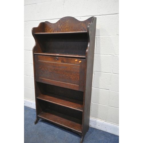 1212 - AN EARLY 20TH CENTURY OAK STUDENT BUREAU, width 76cm x depth 25cm, height 153cm, and a two door wash... 