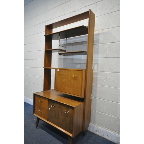 1215 - A MID CENTURY TEAK G PLAN EGOMME ROOM DIVIDER, with four shelves, two fall front cupboard doors and ... 