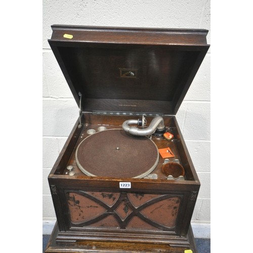 1223 - AN EARLY 20TH CENTURY HIS MASTERS VOICE OAK TABLETOP WIND UP GRAMOPHONE, along with an oak single do... 