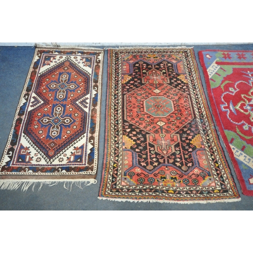 1231 - TWO WOOL PERSIAN RUGS, both of similar patterns, largest rug measurements, 155cm x 97cm, along with ... 