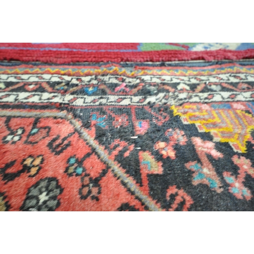 1231 - TWO WOOL PERSIAN RUGS, both of similar patterns, largest rug measurements, 155cm x 97cm, along with ... 