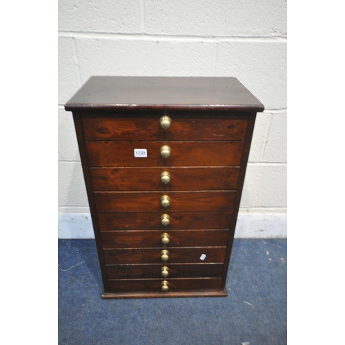 1235 - A SMALL STAINED PINE CHEST OF NINE DRAWERS, width 41cm x depth 31cm x height 71cm (condition report:... 