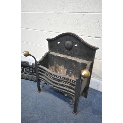 1242 - A CAST IRON FIRE GRATE, with brass finials, width 62cm x depth 34cm x height 67cm, along with a cast... 