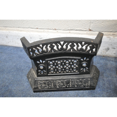 1242 - A CAST IRON FIRE GRATE, with brass finials, width 62cm x depth 34cm x height 67cm, along with a cast... 